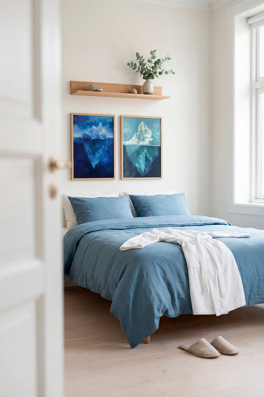 Bedroom interior with blue Iceberg Night posters creating a calm and relaxing atmosphere above the bed