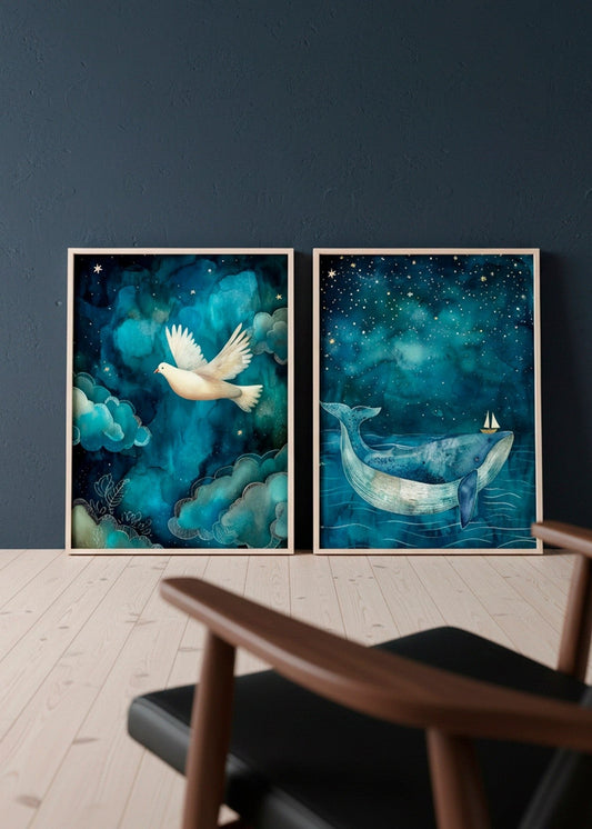 Two framed posters — One Big Friend with a dreamy blue whale under a starry sky and One Small Friend with a white dove flying through soft teal clouds — styled against a deep blue wall in a Nordic interior.