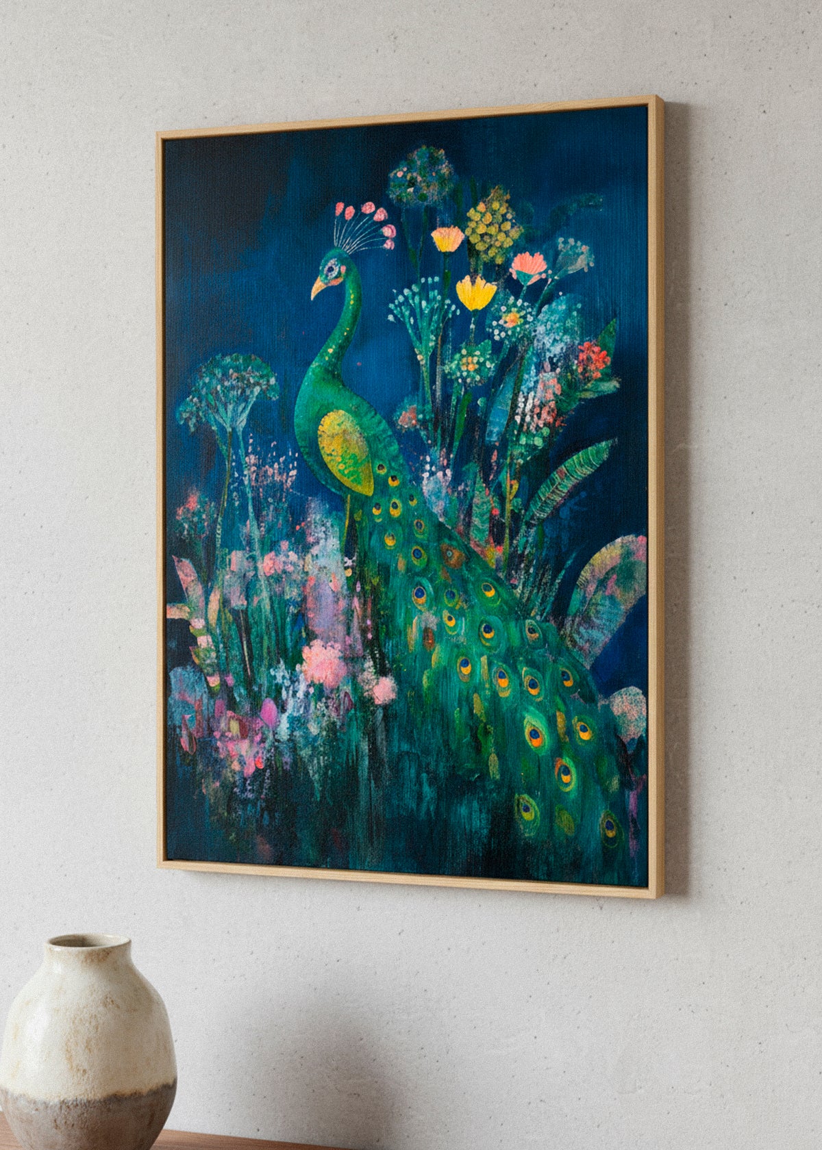 “Peacock” canvas print above a bed with dark green bedding, styled in moody light for a sophisticated and artistic look.