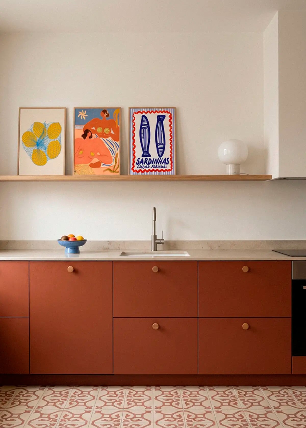 5 Lemons in a Net, Lemon and Melon and Lisbon Sardines posters styled on a kitchen shelf in a modern Scandinavian kitchen