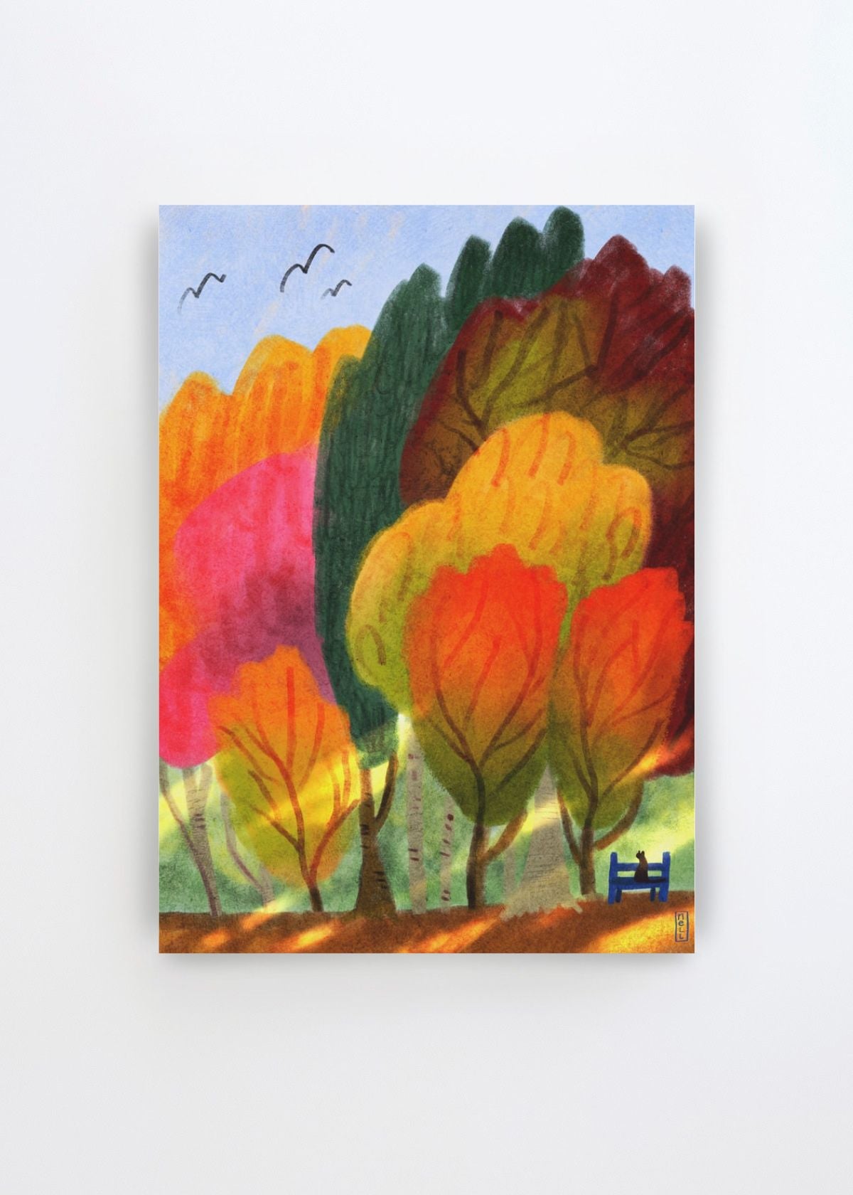 Cat On a Park Bench and Summer Trees by Dirkie Nell art print featuring a colourful park landscape with layered trees in orange, pink, green and red, a small blue bench and birds beneath a pale blue sky.