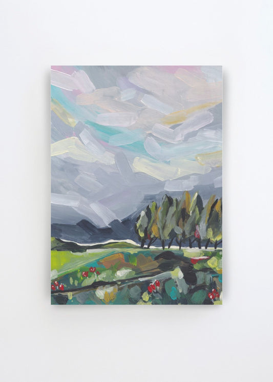 Colorful Abstract Landscape by Dirkie Nell art print featuring layered blue-grey skies, turquoise water, green fields, dark hills and expressive trees painted in a loose, colourful style.