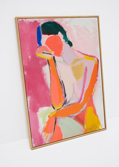 Feminine canvas print with a stylized abstract female figure in bright pink, orange and yellow tones, perfect for modern interior design