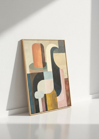 Harmonious canvas print leaning against a white wall in bright natural light, showing textured abstract shapes in muted greens, browns, and creams.