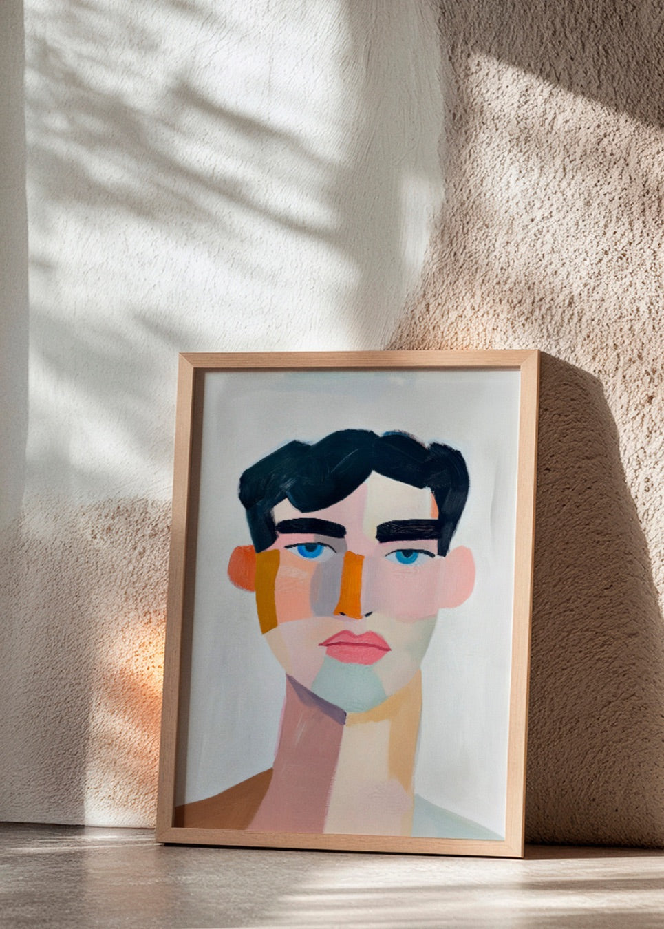 Bold and modern portrait poster titled "Male," showcasing a stylized male face with geometric color blocks and intense blue eyes, styled with soft sunlight.