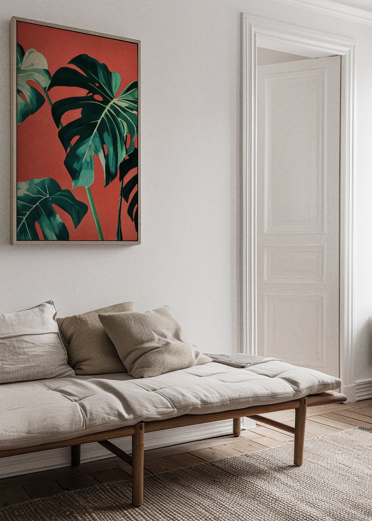 Monstera poster in living room with light sofa and neutral pillows