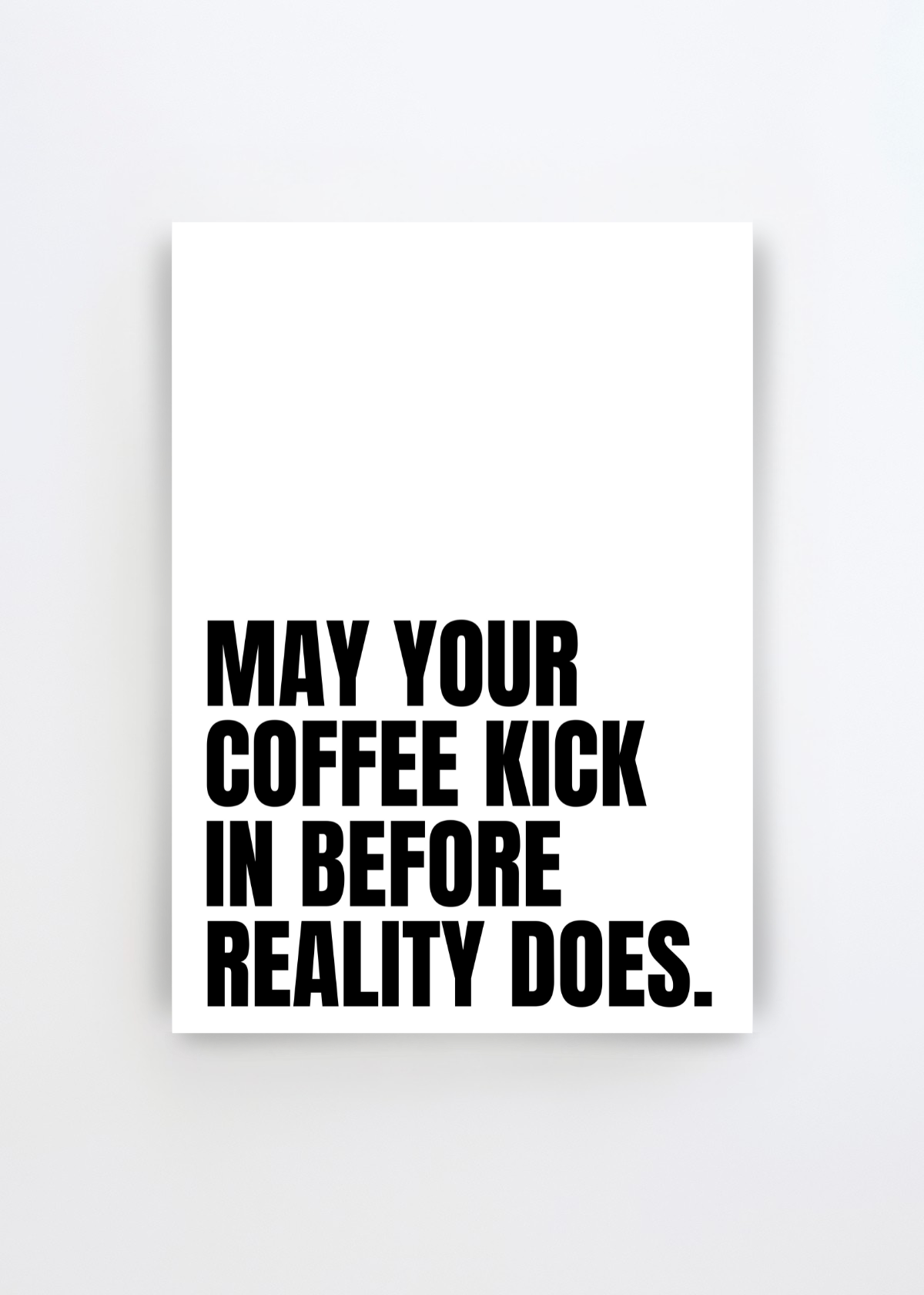 Morning Brew Boost by Athene Fritsch typographic art print featuring the phrase “May Your Coffee Kick In Before Reality Does.” in bold black lettering on a clean white background.