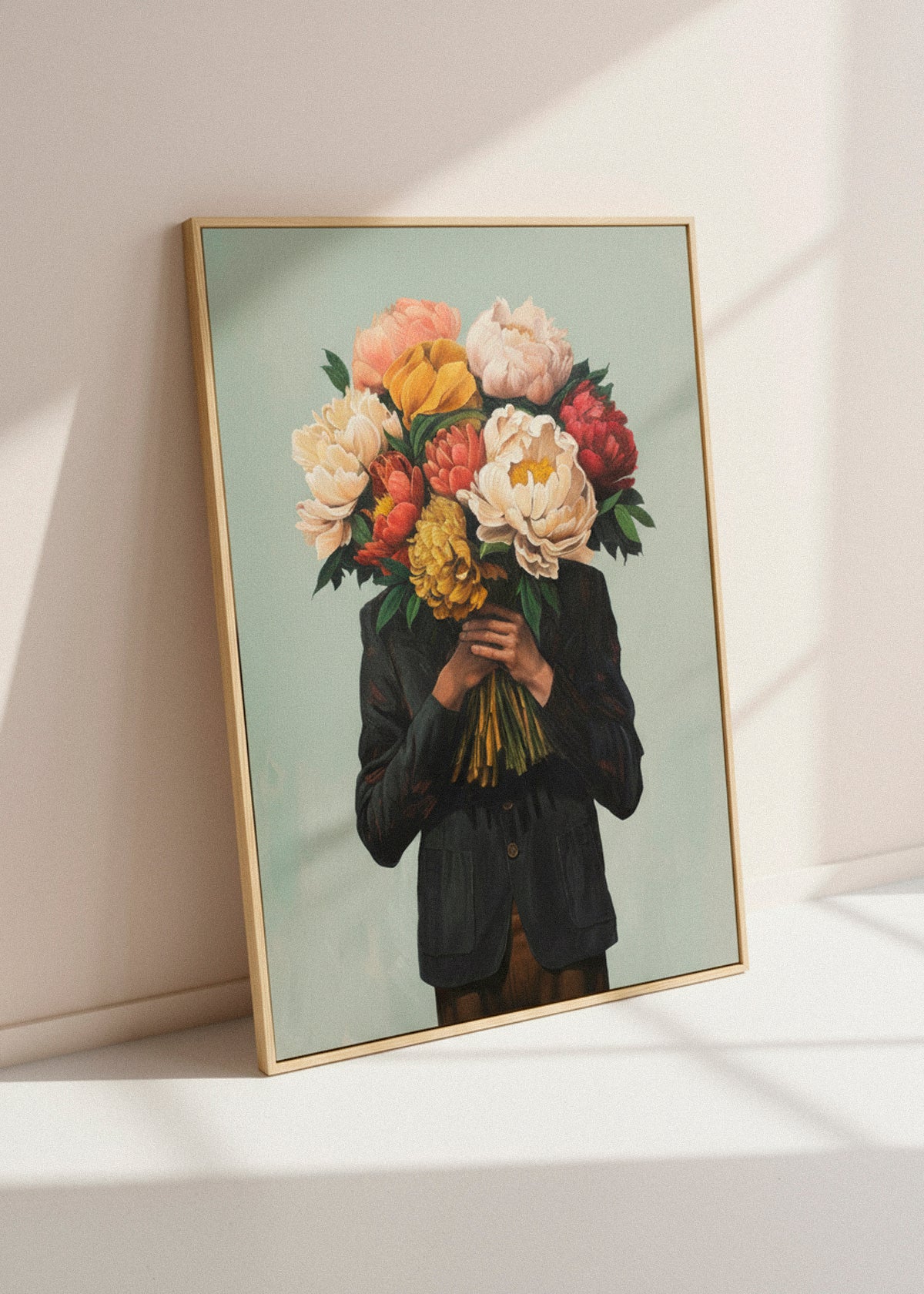 Framed “Mr. Flowerhead” canvas print with soft light and muted green wall, combining botanical beauty with modern calm.