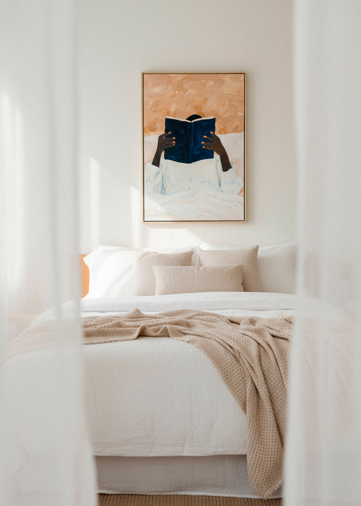 “Must Read” canvas print displayed against a light wall with flowers in the foreground, radiating calm and mindfulness.