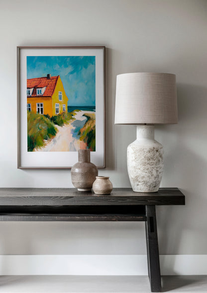 My Summer House poster in a modern Scandinavian living room with dark wood console and neutral decor, featuring a colorful yellow beach house with blue sky and coastal landscape tones.