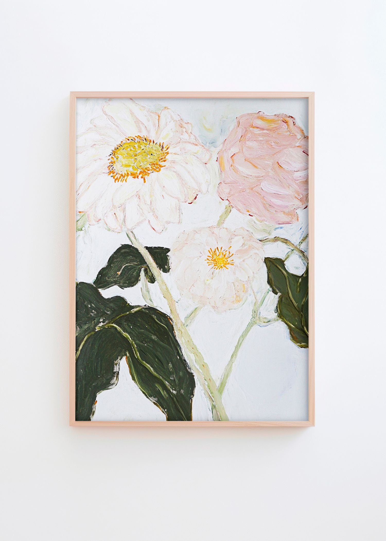 Pale Bloom floral poster in a natural oak frame featuring soft white and blush pink flowers, styled on a white wall in a bright Scandinavian interior by Hello Poster