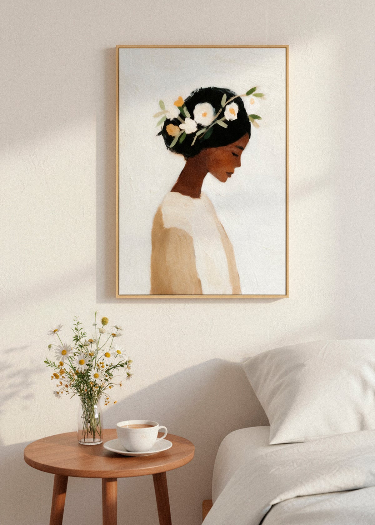 Framed “Saint” canvas print above a rattan chair in a sunlit room, styled with soft beige tones and Scandinavian calm.