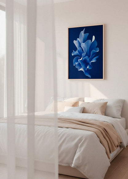 Shape No. 80 art print in oak frame hanging above a soft neutral bedroom, Scandinavian interior with morning sunlight and calm textiles.