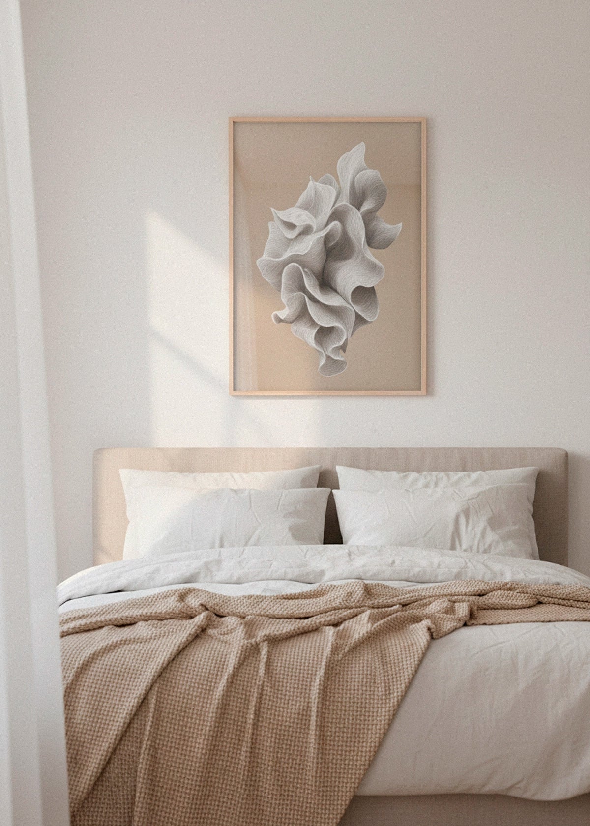 Shape No. 70 abstract line-art poster in a natural wooden frame, hanging above a soft beige bed in a light Scandinavian bedroom with warm sunlight.