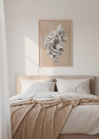 Shape No. 70 abstract line-art poster in a natural wooden frame, hanging above a soft beige bed in a light Scandinavian bedroom with warm sunlight.