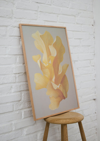 Shape no. 60 poster from HelloPoster in oak frame leaning against white brick wall, with abstract yellow design on grey background