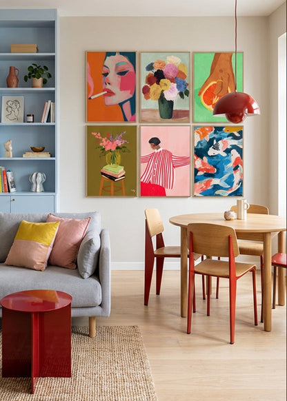Colorful Hello Poster gallery wall featuring Smoke, Blossoms, Fruit Lover, Floral Vase, Red Stripes and Koi posters styled in a bright Scandinavian living and dining room with soft blue shelving, oak table and modern decor.