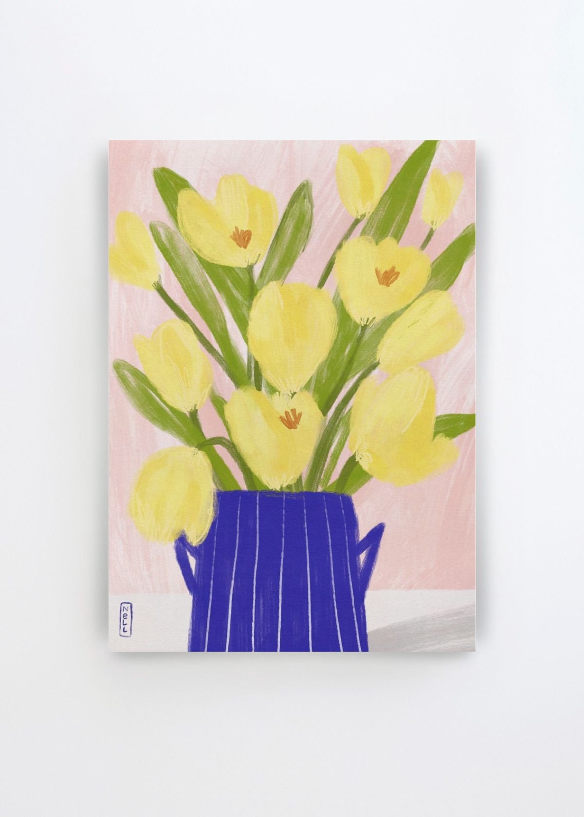 Spring Tulips Blue Vase by Dirkie Nell art print featuring soft yellow tulips with green leaves arranged in a bold cobalt blue vase against a pale pink and cream background.