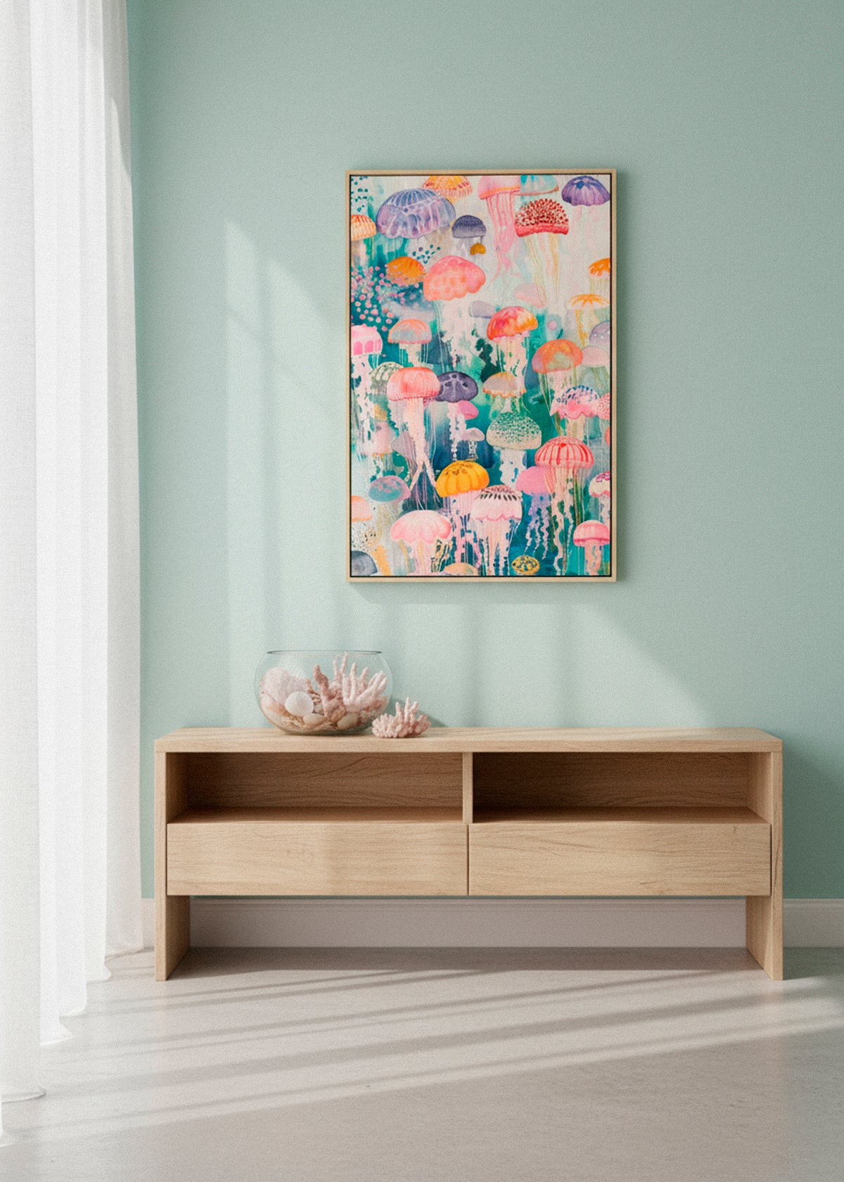 Canvas print of colorful jellyfish hanging on a mint-green wall in a bright Scandinavian room with soft natural light.”