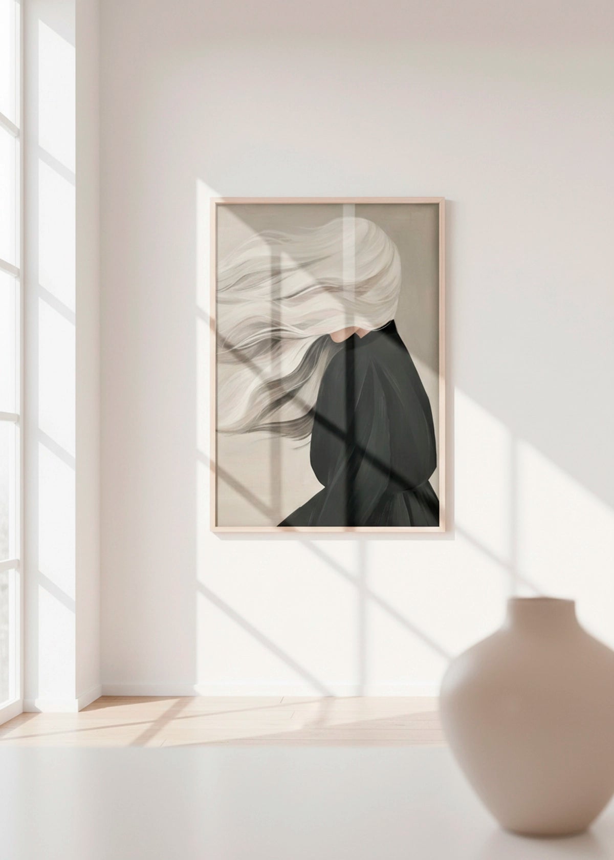 Windy poster hanging in a bright Scandinavian space with strong natural sunlight casting window shadows on the wall.