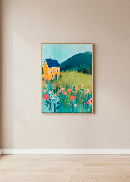 Yellow House canvas print displayed on a neutral wall, featuring a vibrant landscape with flowers and mountains.