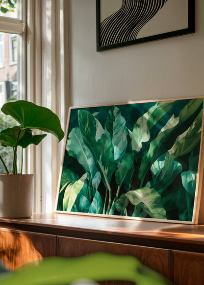 Plant poster leaning against a wall in a sunlit space – A lush botanical print adding a fresh, natural vibe to a modern home with wooden and earthy tones.