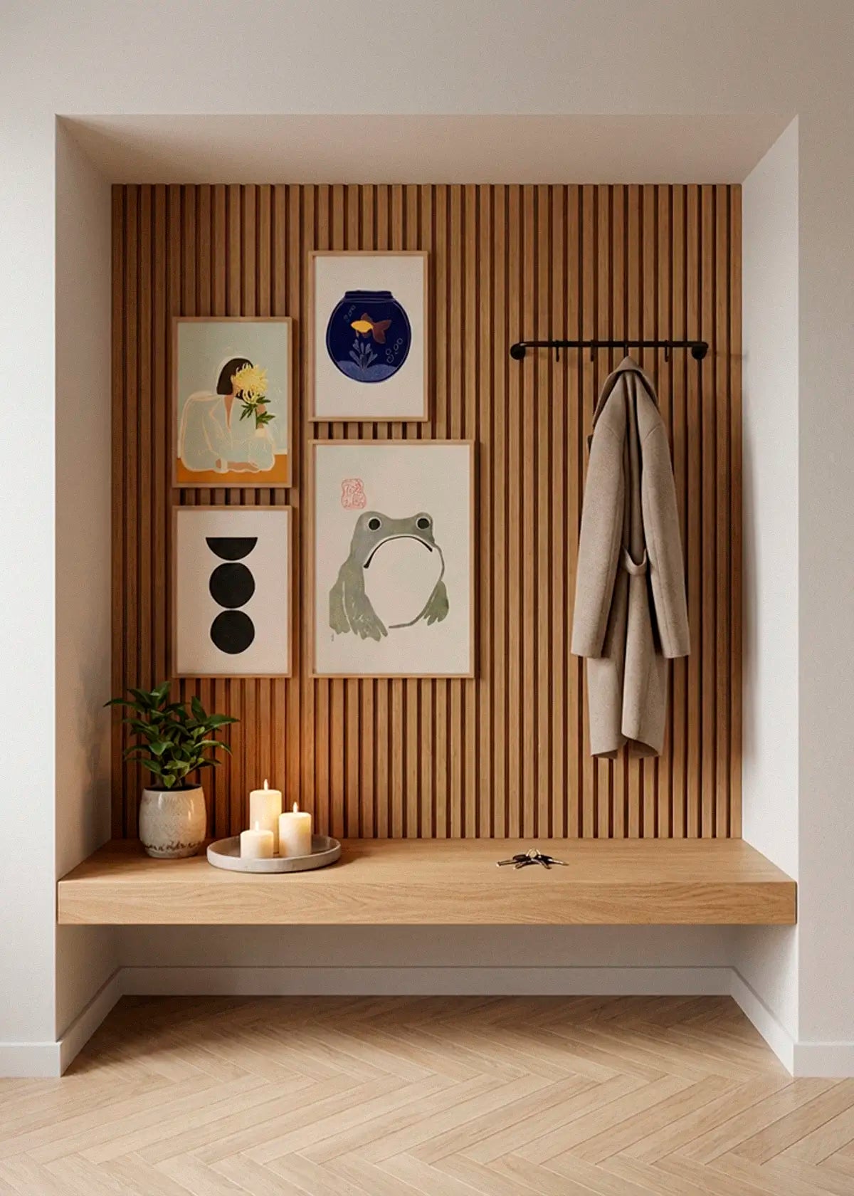 The Chrysanthemum, Fishy, Boulder and Grumpy Frog posters styled as a gallery wall in a modern Scandinavian entryway